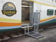 Handicapped lift into rail car